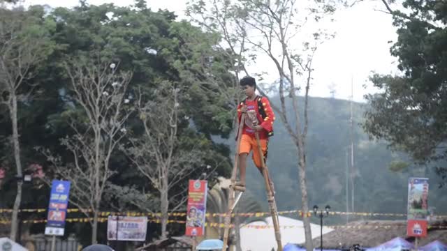Stilt Racing Bizarre race on stilts reaches new heights at hill tribe sports day in ...